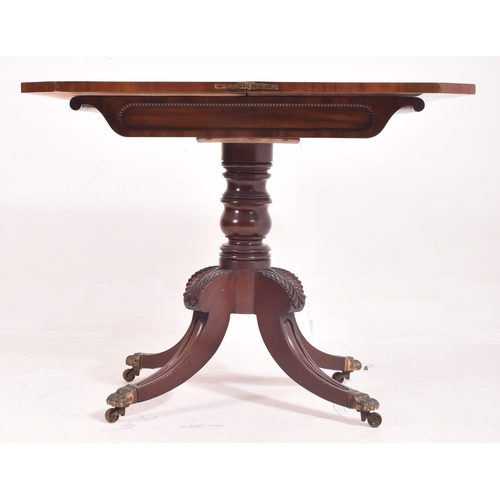 281 - A 19th century William IV Regency mahogany games / card table. The fold over swivel top supported by... 