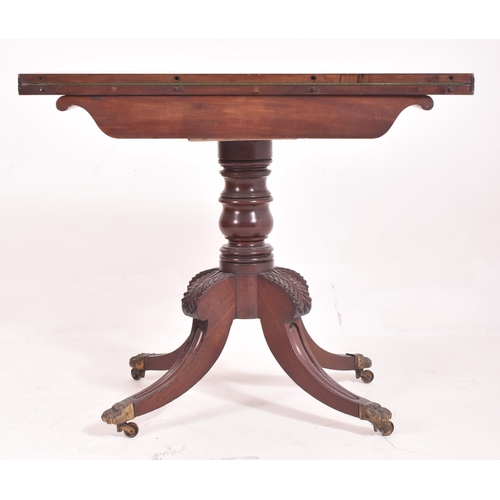 281 - A 19th century William IV Regency mahogany games / card table. The fold over swivel top supported by... 