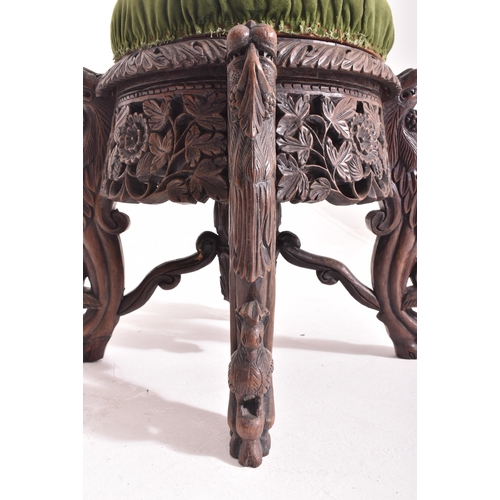 285 - An Indo-Burmese Anglo-Colonial 19th century carved hardwood & upholstered stool seat. The stool havi... 