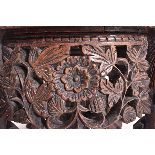 285 - An Indo-Burmese Anglo-Colonial 19th century carved hardwood & upholstered stool seat. The stool havi... 