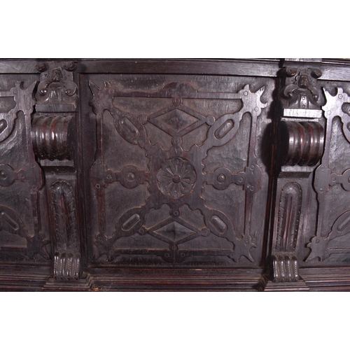 288 - A Continental 19th century heavily carved oak dresser stamped Frank Giles & Co, Kensington. The dres... 