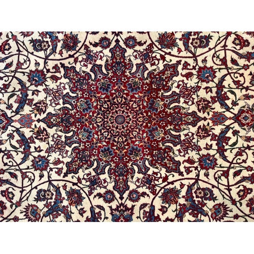 290 - An Iranian Persian Islamic Seirafian Isfahan floor carpet rug. Signed panel to one end translated to... 