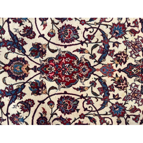 290 - An Iranian Persian Islamic Seirafian Isfahan floor carpet rug. Signed panel to one end translated to... 