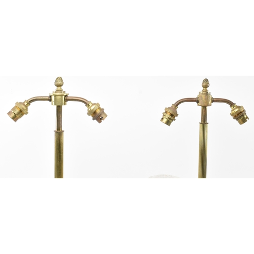 301 - A pair of Regency early 19th century circa 1820s brass & glass table candelabras converted to electr... 