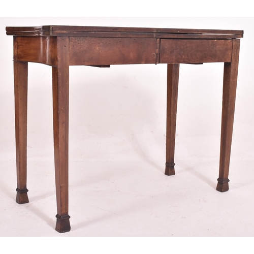 302 - A George III early 19th century mahogany serpentine front card / tea table. The table having a shape... 