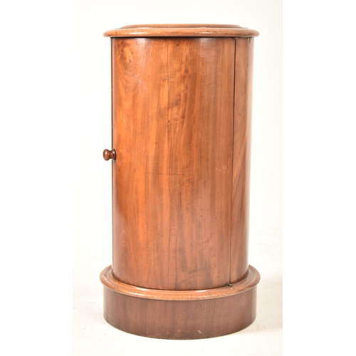 312 - A Victorian 19th century  mahogany cylindrical pot cupboard. The bedside cupboard raised on a pedest... 