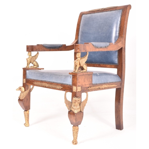 321 - A French Empire style Egyptian revival walnut veneered & brass mounted armchairs. The chair having a... 