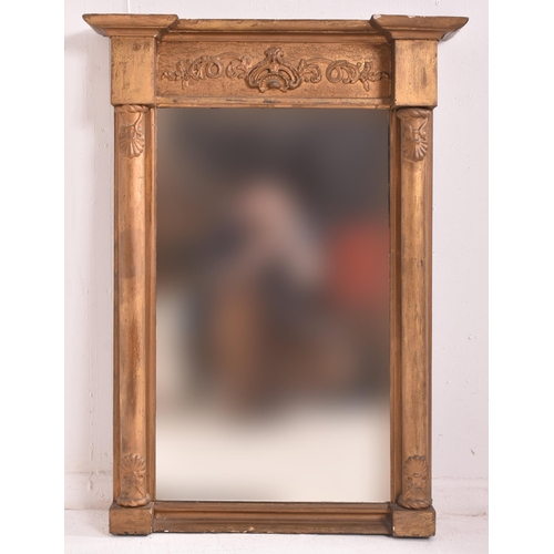 322 - A19th century giltwood pier overmantle wall mirror. The mirror having a pediment atop with scrolled ... 