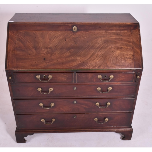 325 - A George III 18th century flame mahogany fall front writing bureau desk. The bureau having a fall fr... 