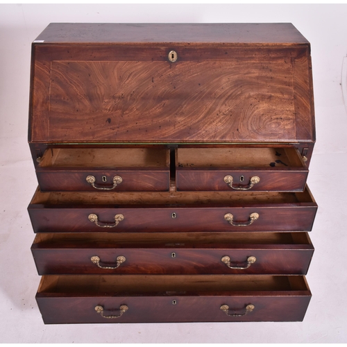 325 - A George III 18th century flame mahogany fall front writing bureau desk. The bureau having a fall fr... 