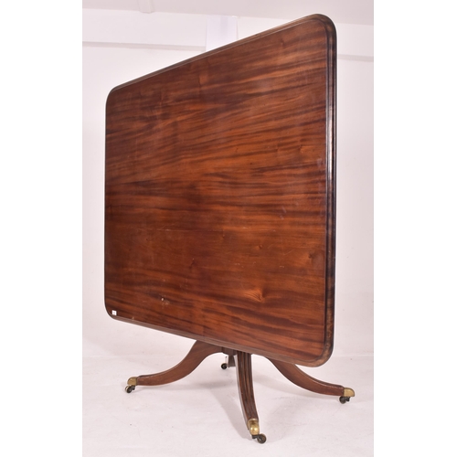 328 - A late 18th century George III solid mahogany tilt top breakfast table. Raised on reeded splayed leg... 