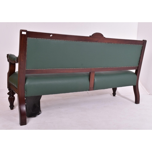 329 - A large Victorian 19th century mahogany hall settle bench settee. The settle having carved lunette s... 