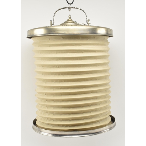 333 - A Turkish Islamic white metal & fabric concertina folding candle lantern light. The lantern having p... 