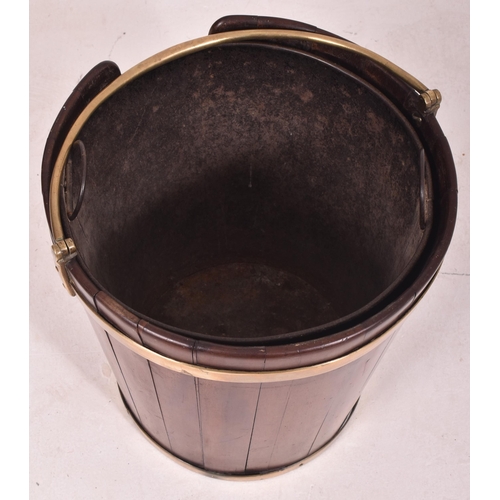 335 - A George III 18th century brass bounded mahogany plate bucket with liner. The bucket having a brass ... 