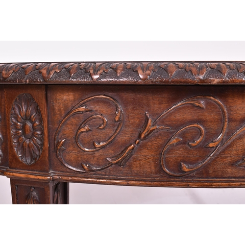 341 - An Adams Revival mahogany demi-lune console hall table. The table having a straight top with carved ... 