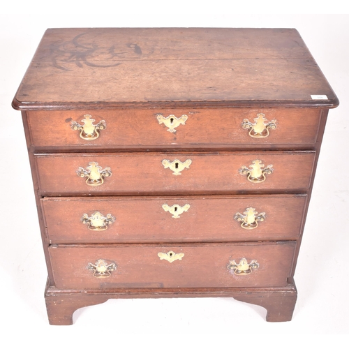 344 - A George III 18th century mahogany bachelor's chest of drawers. The chest having a flared chamfered ... 