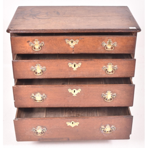 344 - A George III 18th century mahogany bachelor's chest of drawers. The chest having a flared chamfered ... 