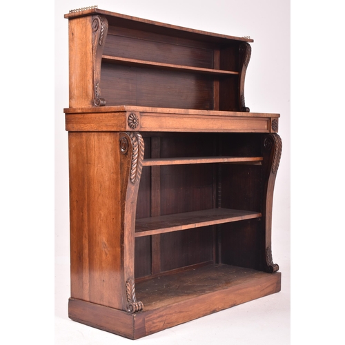 347 - A 19th century rosewood and brass library bookcase. The bookcase having a pierced brass gallery surr... 