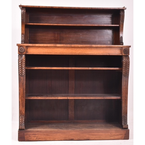 347 - A 19th century rosewood and brass library bookcase. The bookcase having a pierced brass gallery surr... 