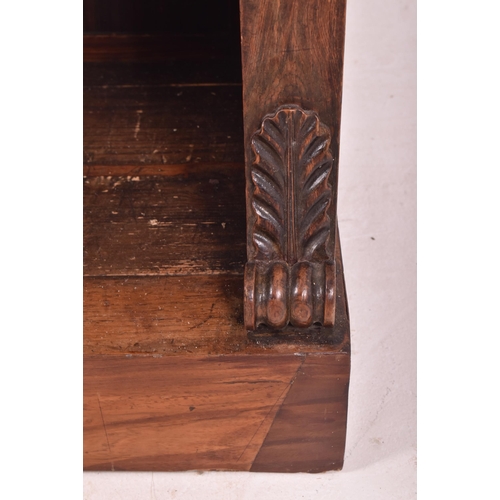 347 - A 19th century rosewood and brass library bookcase. The bookcase having a pierced brass gallery surr... 