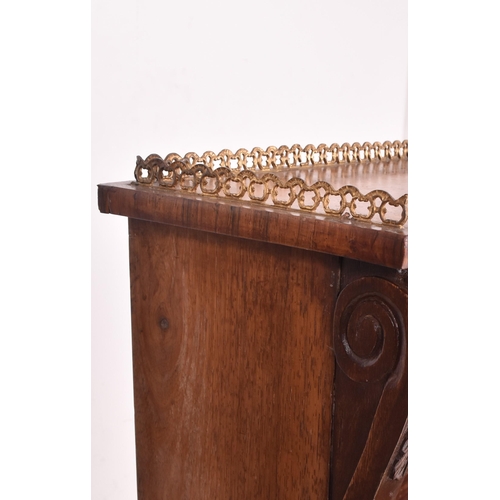 347 - A 19th century rosewood and brass library bookcase. The bookcase having a pierced brass gallery surr... 