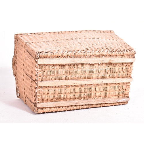 349 - A large believed French continental early 20th century wicker rattan log / laundry basket. The baske... 