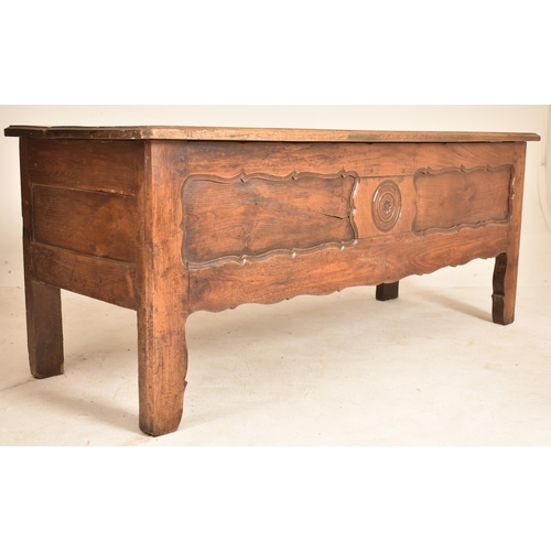 351 - A continental 19th century carved oak window / low coffer. The coffer having a rectangular top over ... 