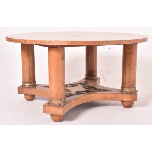 352 - A French Empire inspired ash wood veneered & ormolu round low coffee table. The table having a circu... 