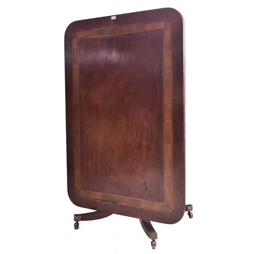 356 - A Regency early 19th century mahogany tilt top pedestal dining / breakfast / loo table. The table ha... 