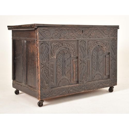 357 - An adjusted part 18th century & later carved oak coffer blanket box. The chest having a rectangular ... 