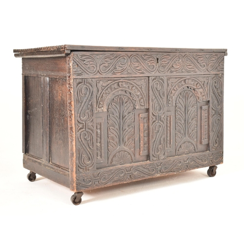 357 - An adjusted part 18th century & later carved oak coffer blanket box. The chest having a rectangular ... 