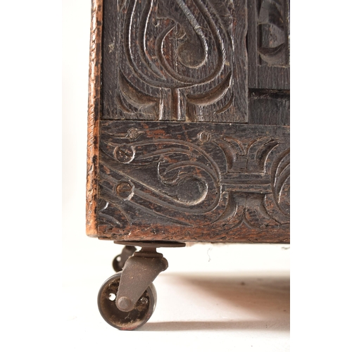 357 - An adjusted part 18th century & later carved oak coffer blanket box. The chest having a rectangular ... 