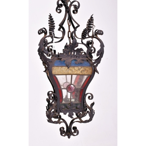 359 - A believed French continental early 20th century wrought iron & leaded coloured glass ceiling lanter... 