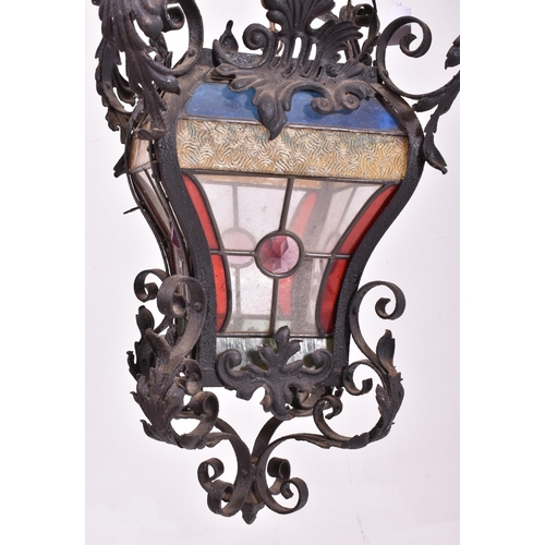 359 - A believed French continental early 20th century wrought iron & leaded coloured glass ceiling lanter... 