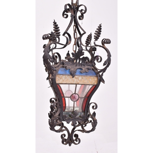 359 - A believed French continental early 20th century wrought iron & leaded coloured glass ceiling lanter... 