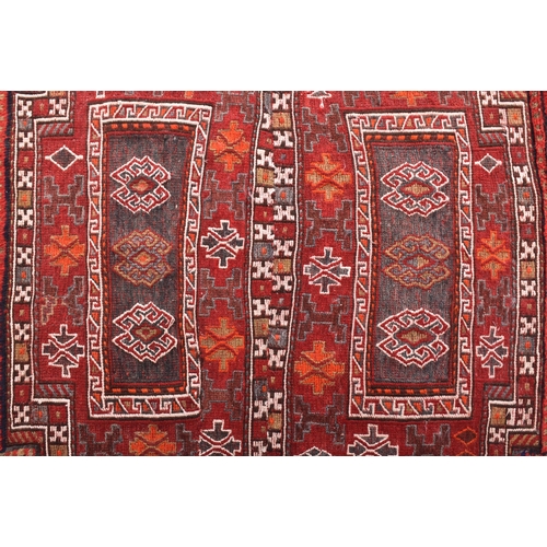 361 - A 20th century Bahtiyari Kilim floor carpet / rug. The rug having round ground with two central fiel... 