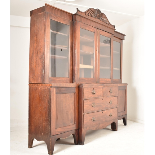 362 - A Channel Islands 19th century mahogany breakfront display bookcase cabinet. The cabinet having a ca... 