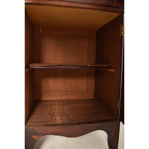 362 - A Channel Islands 19th century mahogany breakfront display bookcase cabinet. The cabinet having a ca... 