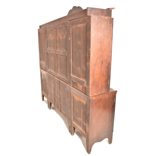 362 - A Channel Islands 19th century mahogany breakfront display bookcase cabinet. The cabinet having a ca... 