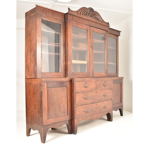 362 - A Channel Islands 19th century mahogany breakfront display bookcase cabinet. The cabinet having a ca... 