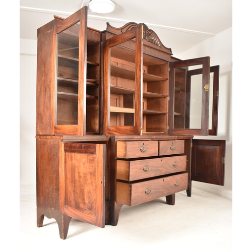 362 - A Channel Islands 19th century mahogany breakfront display bookcase cabinet. The cabinet having a ca... 