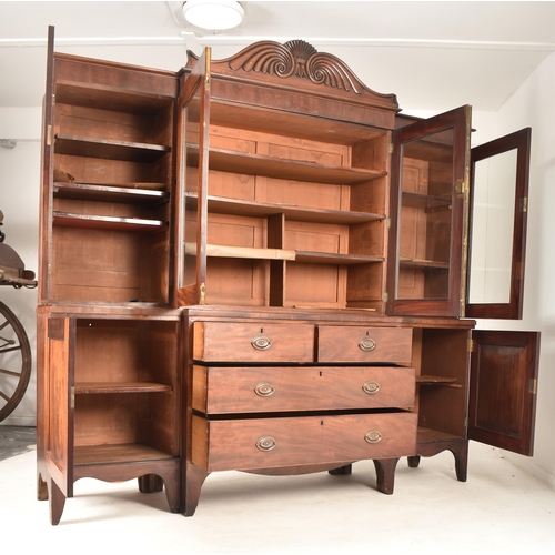 362 - A Channel Islands 19th century mahogany breakfront display bookcase cabinet. The cabinet having a ca... 