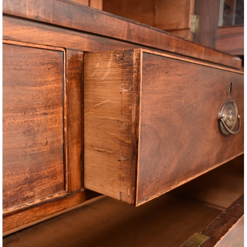 362 - A Channel Islands 19th century mahogany breakfront display bookcase cabinet. The cabinet having a ca... 