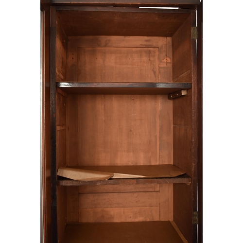 362 - A Channel Islands 19th century mahogany breakfront display bookcase cabinet. The cabinet having a ca... 