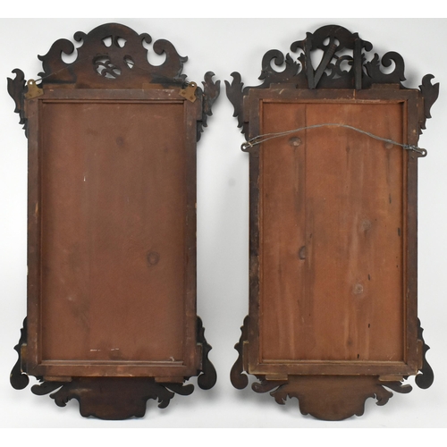 368 - A pair of 19th century mahogany gilded pier mirrors. Each having crested top with phoenix in relief ... 