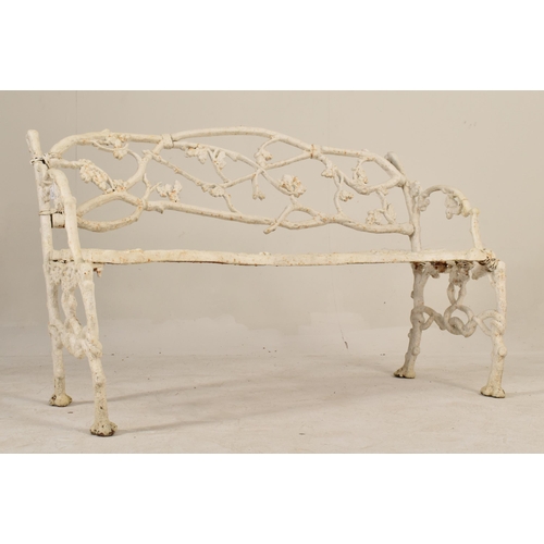 370 - A Victorian 19th century painted cast iron vine three seater garden patio bench. The bench having wh... 