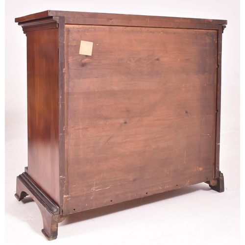 376 - A Biedermeier 19th century flame mahogany veneered small chest of drawers / commode. The chest havin... 