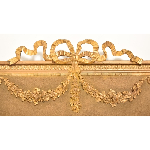 378 - A French inspired continental 19th century giltwood Trumeau overmantle wall mirror. The mirror havin... 