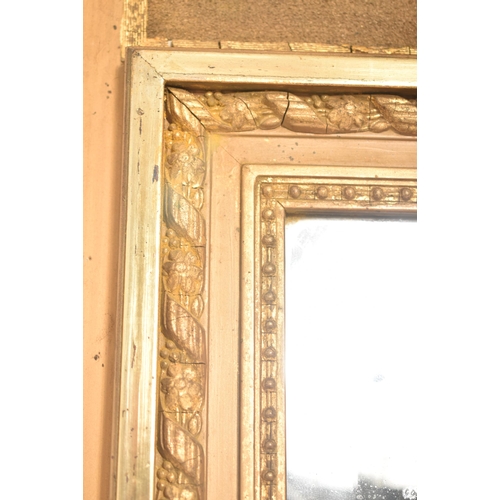 378 - A French inspired continental 19th century giltwood Trumeau overmantle wall mirror. The mirror havin... 