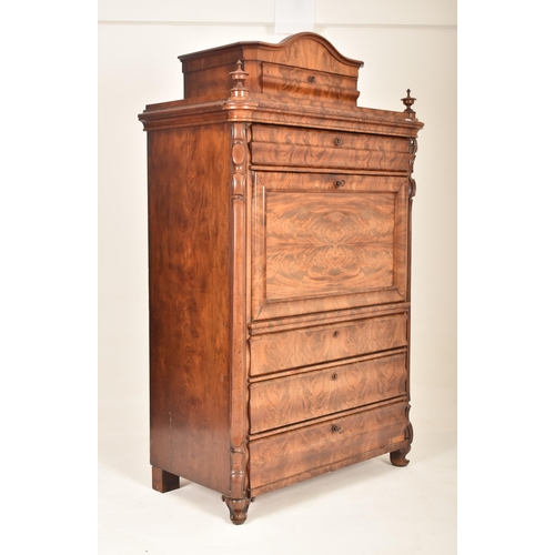 381 - A 19th century Biedermeier walnut secretaire bureau Abattant. The secretaire having a bowed top pedi... 